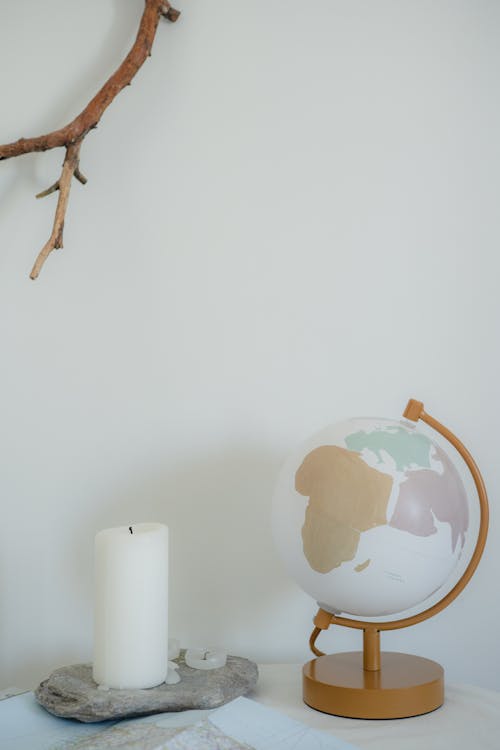 A Globe Table lamp and Candles