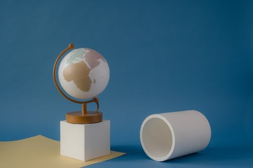 A Globe over a White Box