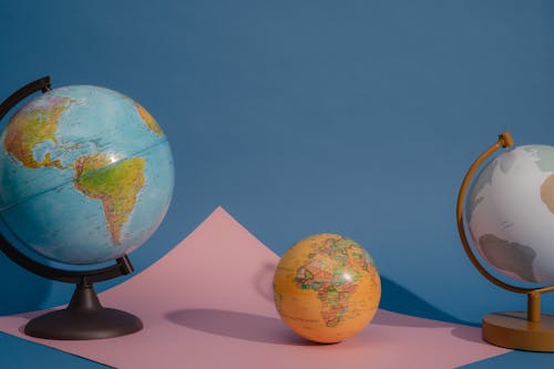 Globes on Pink Paper