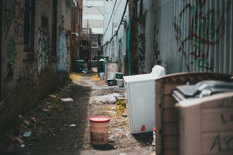 Empty Street With Trash On Ground