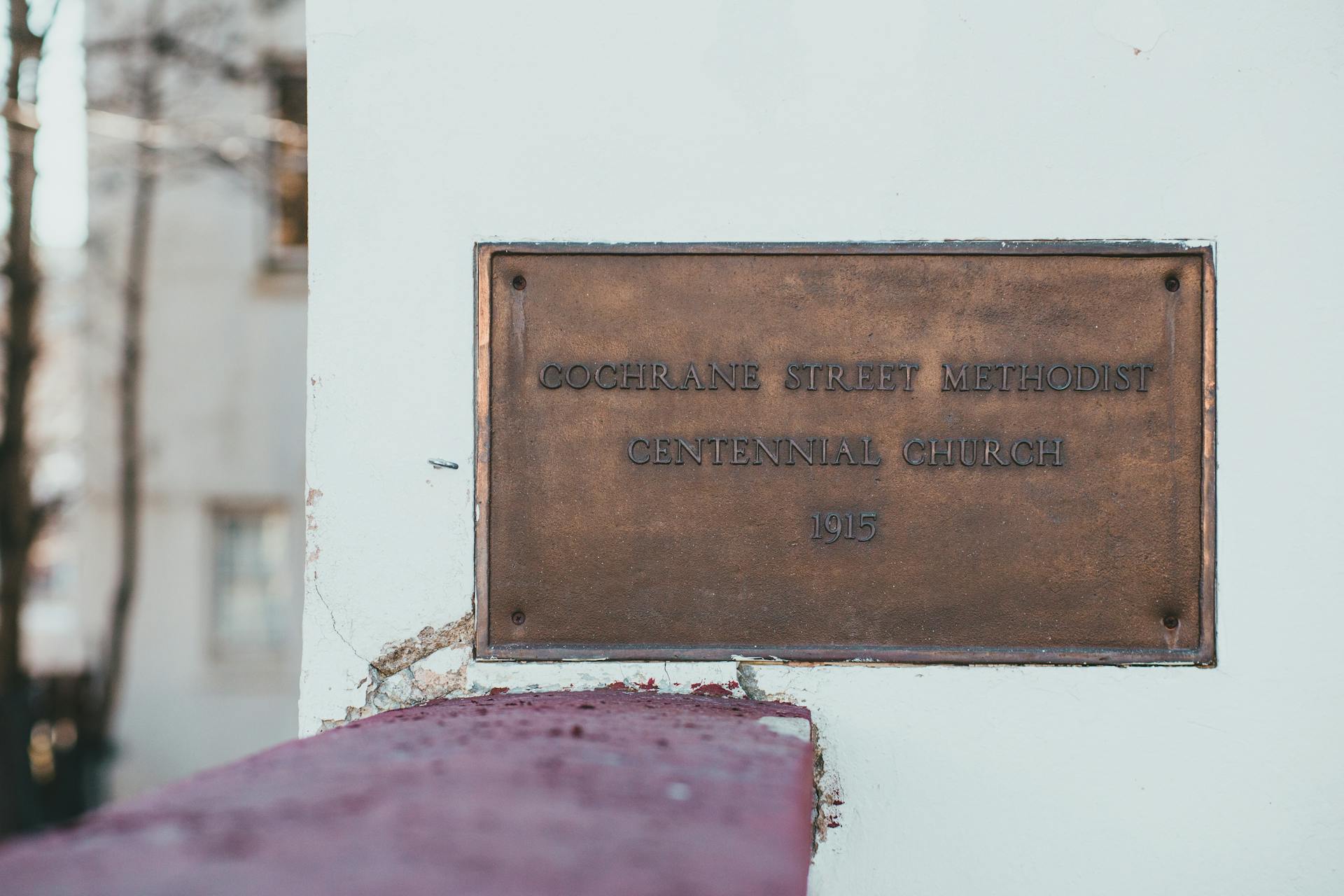 Bronze plaque of Cochrane Street Methodist Centennial Church established in 1915.