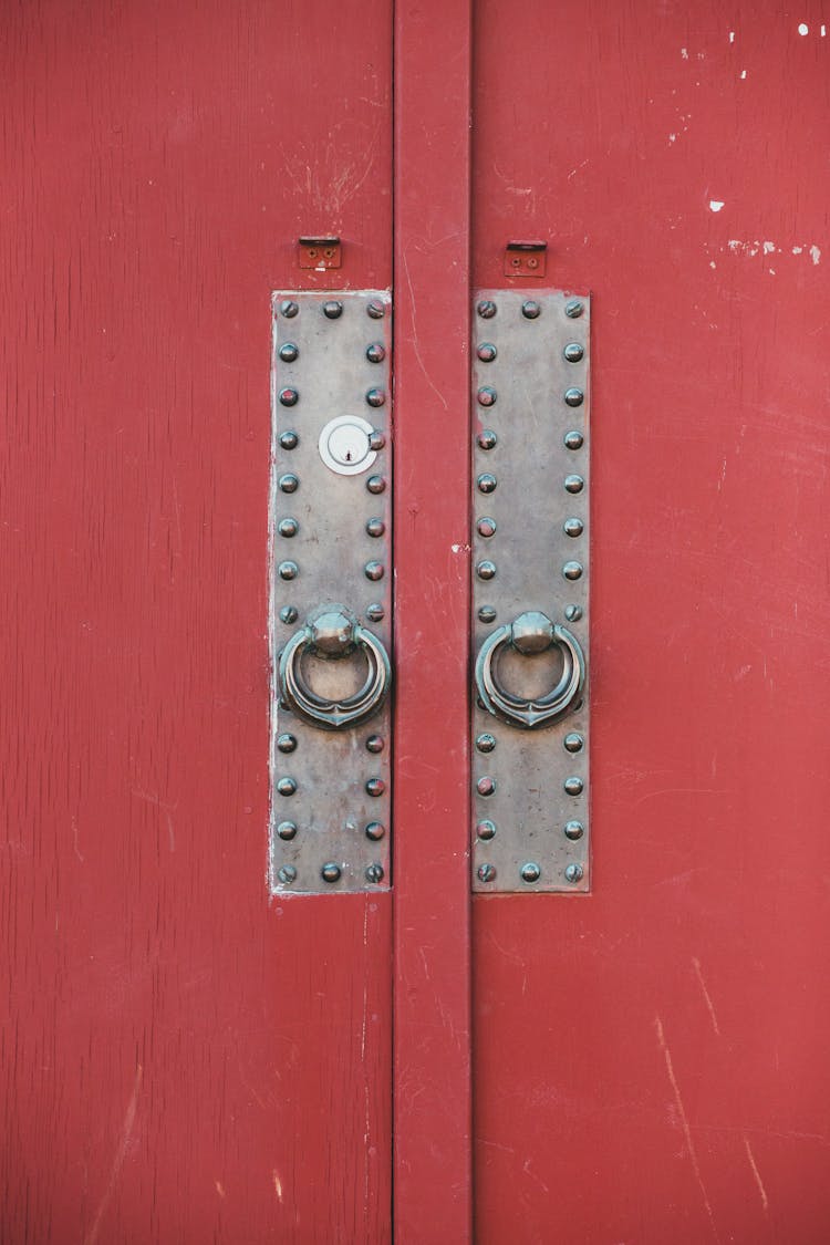 Red Shabby Door With Metal Handle