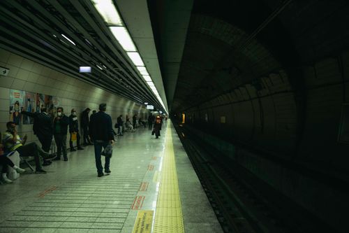 Free People waiting at a subway station in Istanbul, capturing daily life and public transport dynamics. Stock Photo