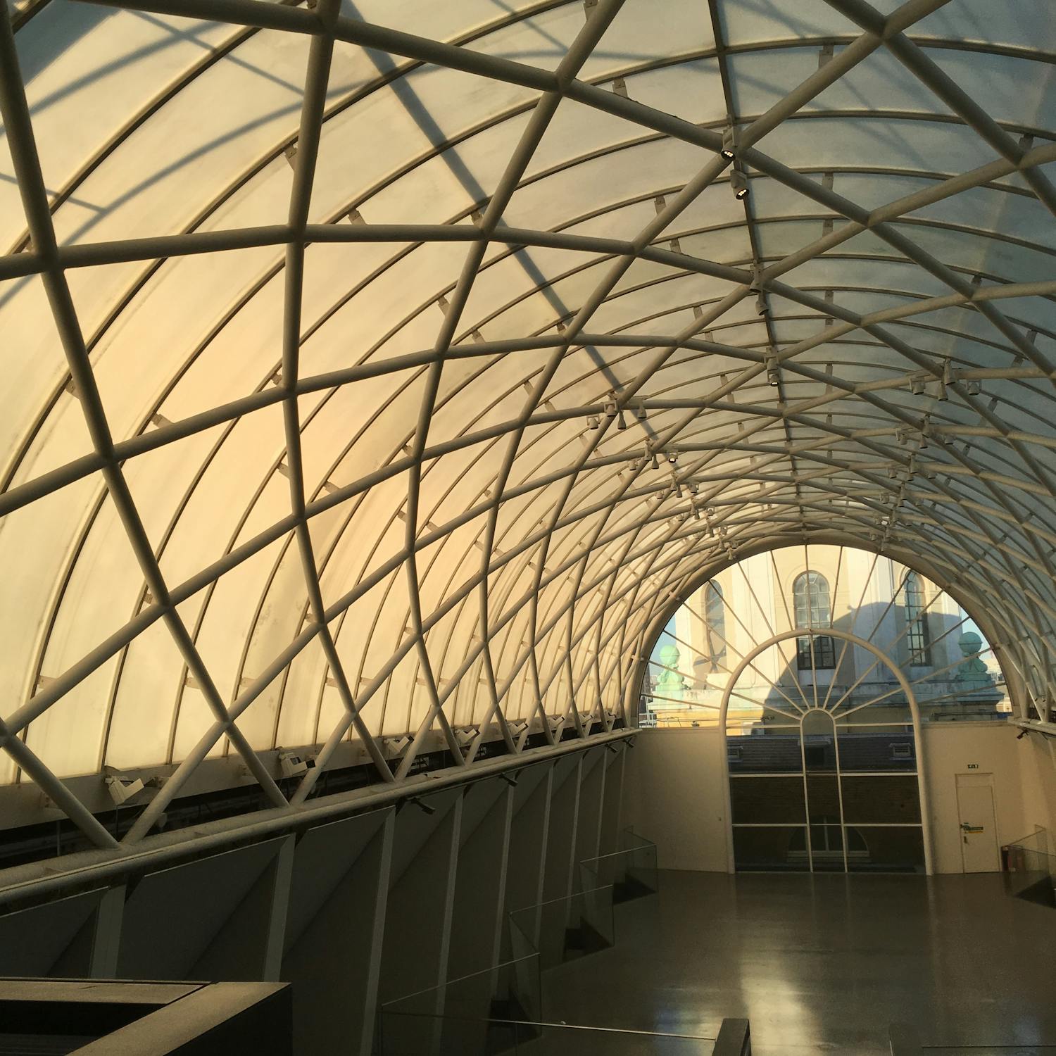 AI-generated music flooding streaming platforms Headphones on a laptop showing a music streaming app with AI-generated song titles and fake band names