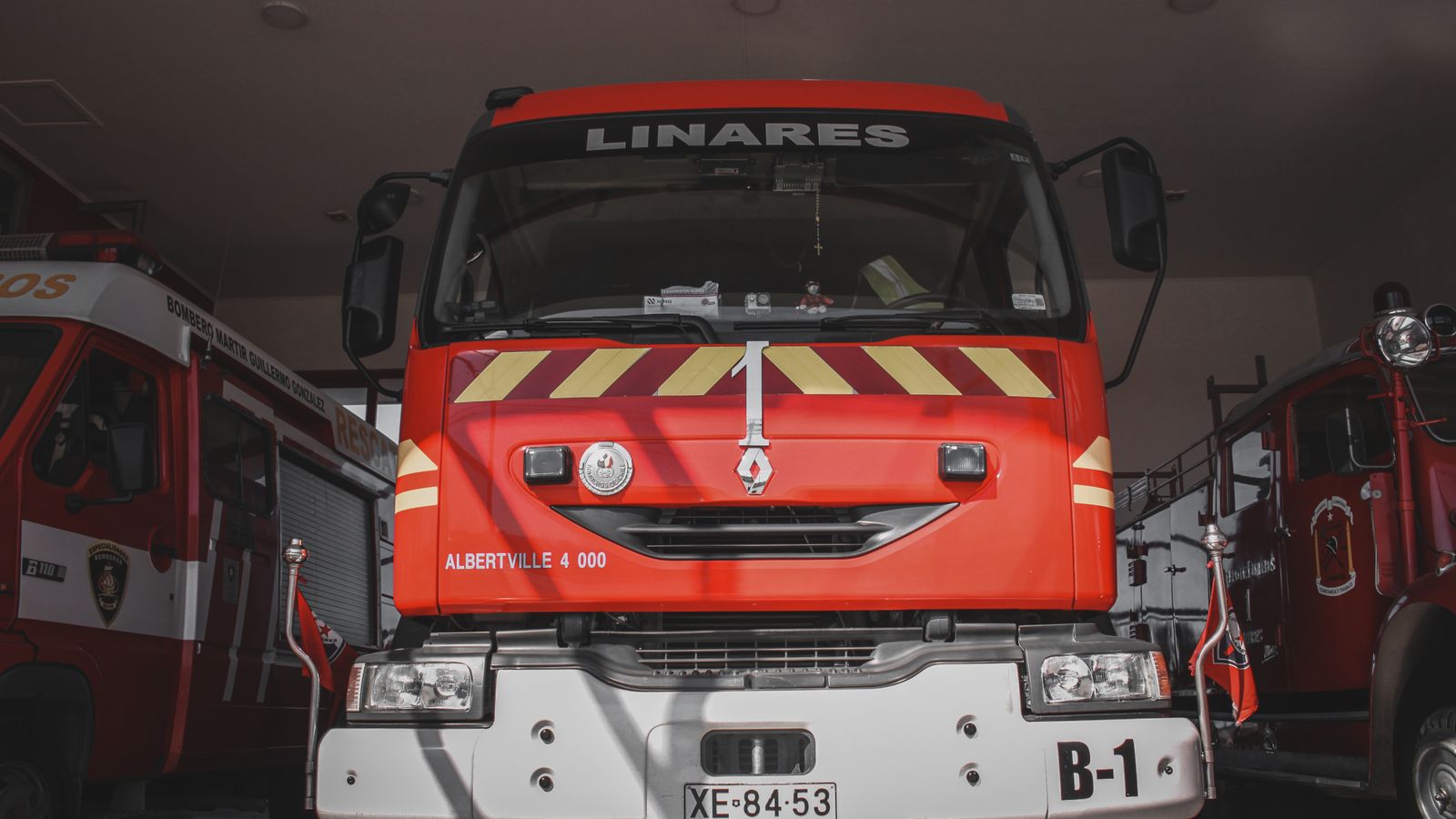 Front view of a parked fire engine in Linares garage, Maule, Chile.