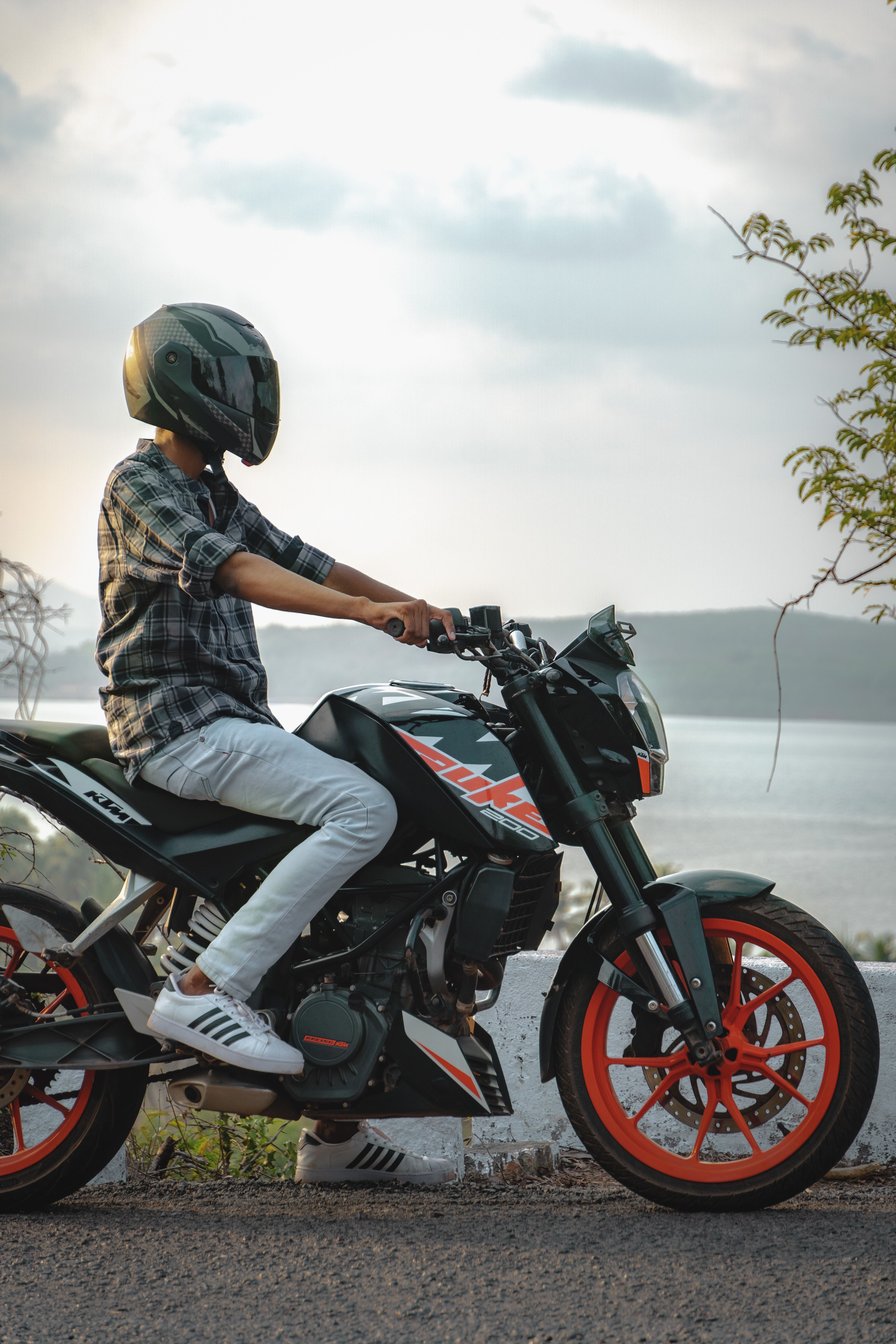 A Woman Riding a Motorcycle · Free Stock Photo