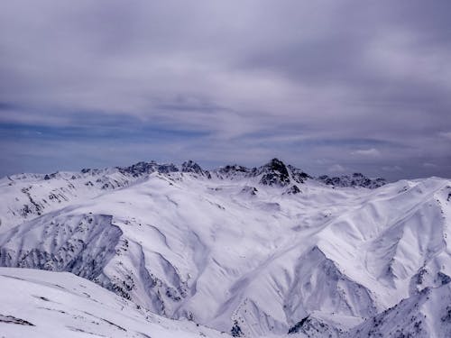 Бесплатное стоковое фото с высокий, гора, зима