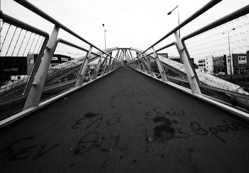 Grayscale Photo of a Bridge