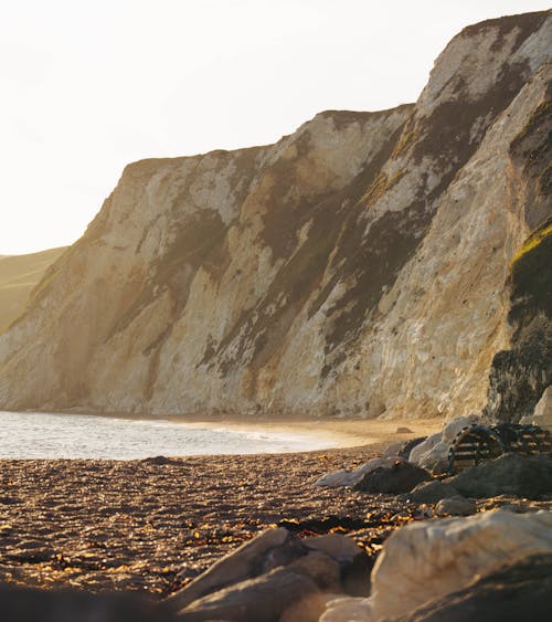 Rock Formation Beside Body of Water 