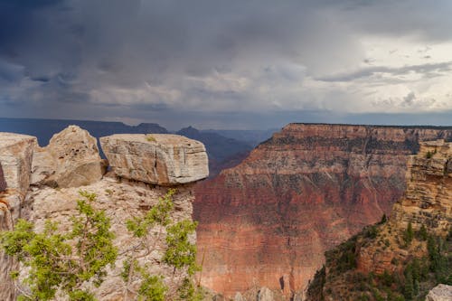 Brown Rocky Mountain Under Gloomy Sky