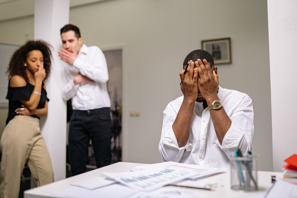 Free Man in White Dress Shirt Covering His Face Stock Photo