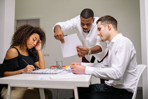 Free Three People Working in the Office Stock Photo