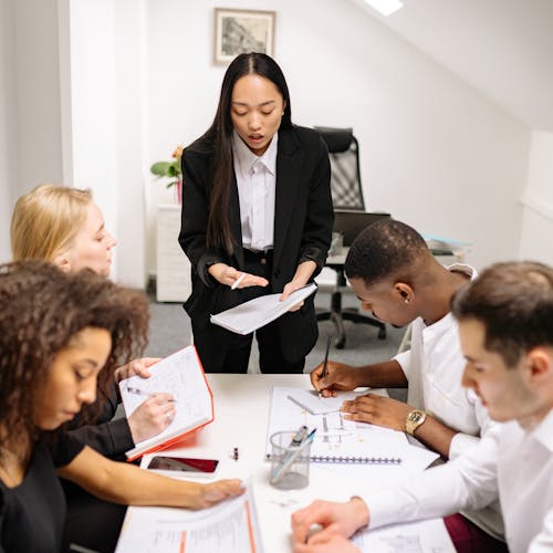 Woman Talking at the Meeting