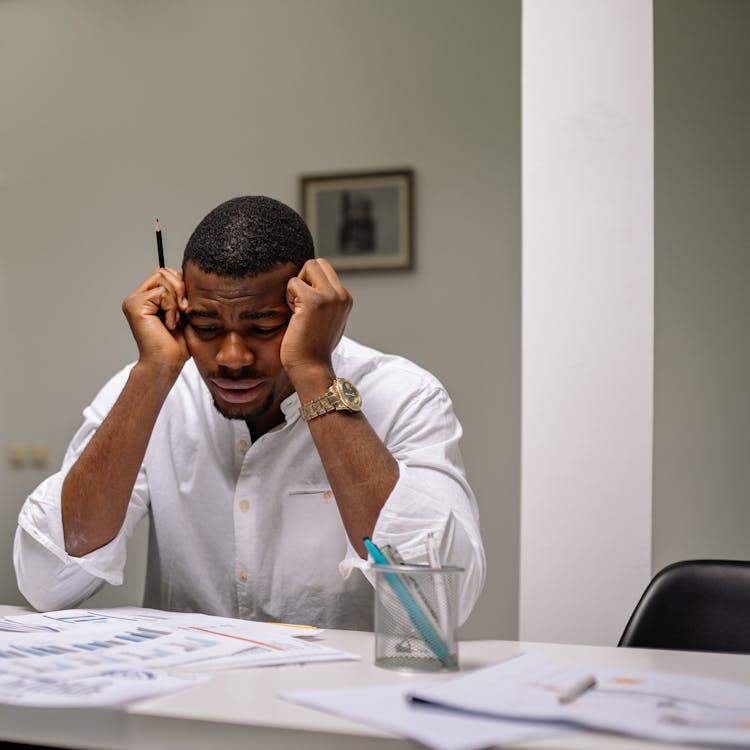 A Stressed Man At Work