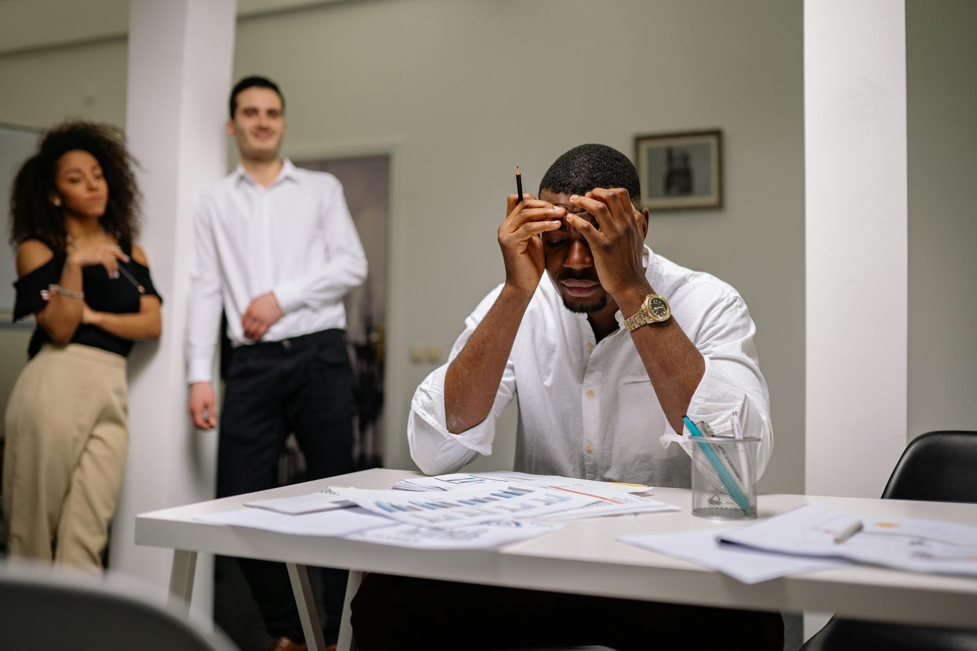 A Problematic Man Sitting in the Office