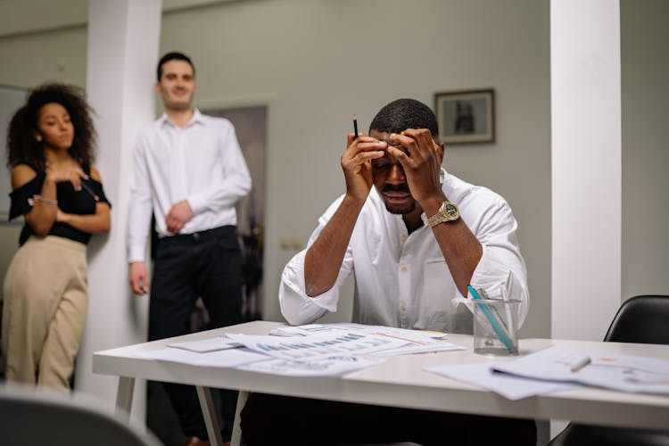 A Problematic Man Sitting In The Office