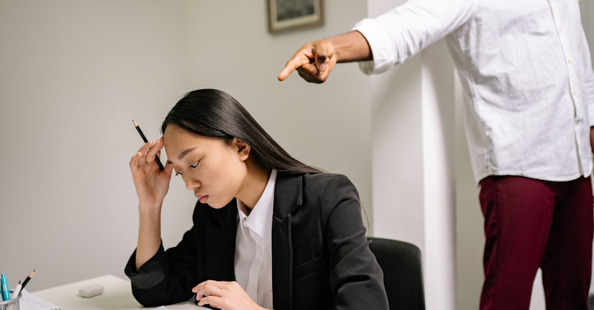 Office Environment With A Stressed Boss Overseeing Employees, Showing Tension And Pressure In The Workplace