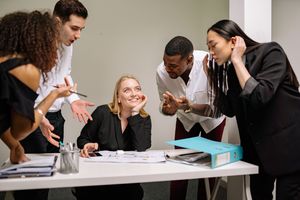 Colleagues in conversation at the office — photo by Yan Krukau on Pexels