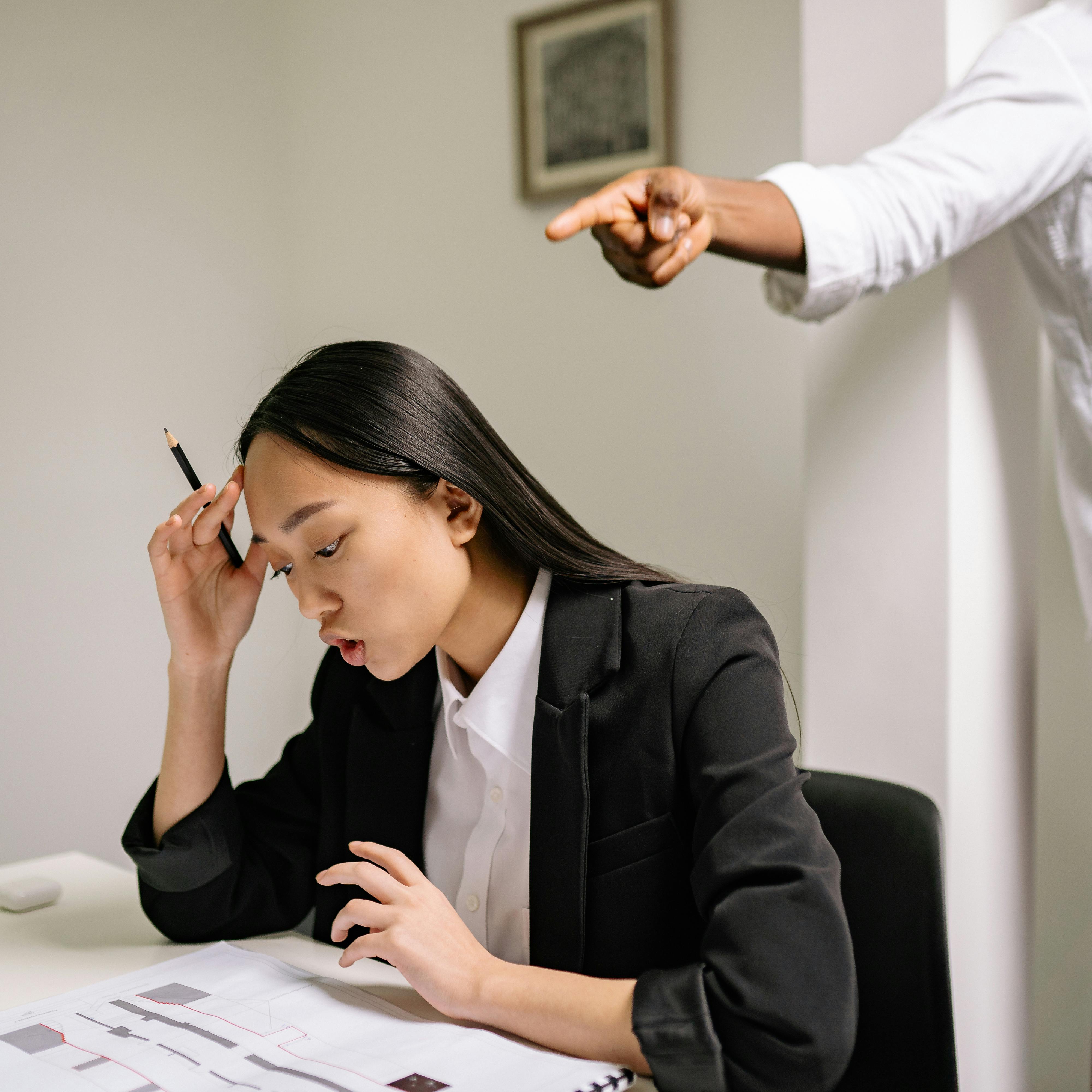 A Woman Sitting in the Office