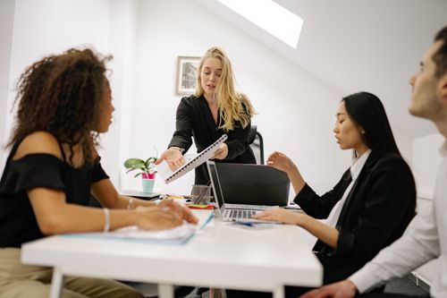 Free Diverse team engaged in a business meeting, collaborating and discussing ideas. Stock Photo