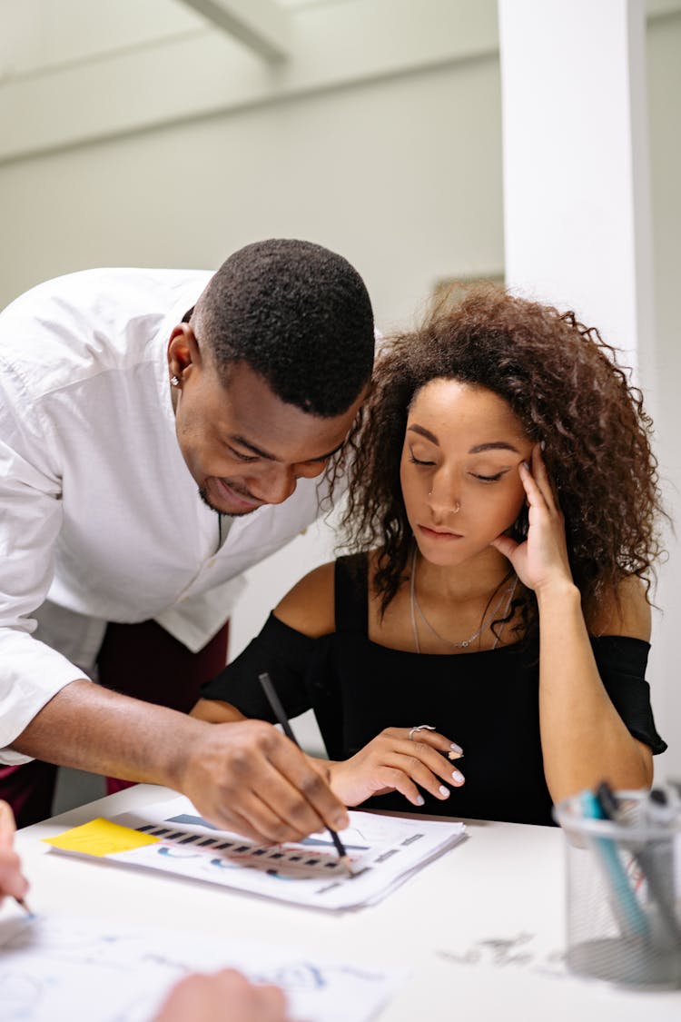 Men And Women Collaborating At Work