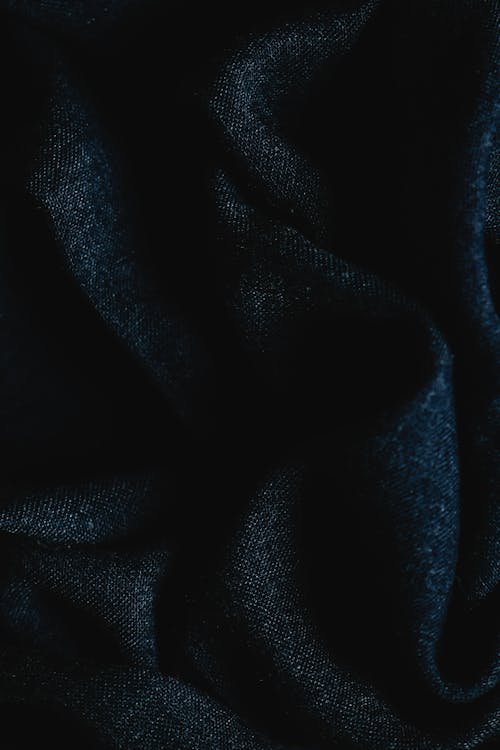 Dark Blue Textile in Close-Up Photography