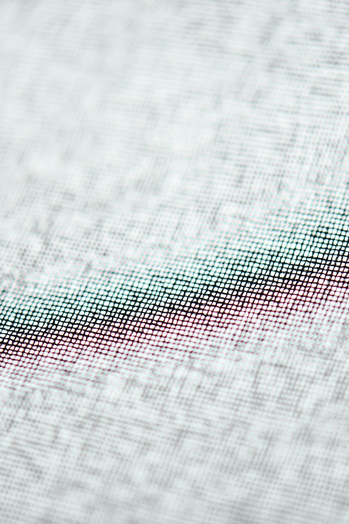 Macro shot of dye bonded inside the fabric weave