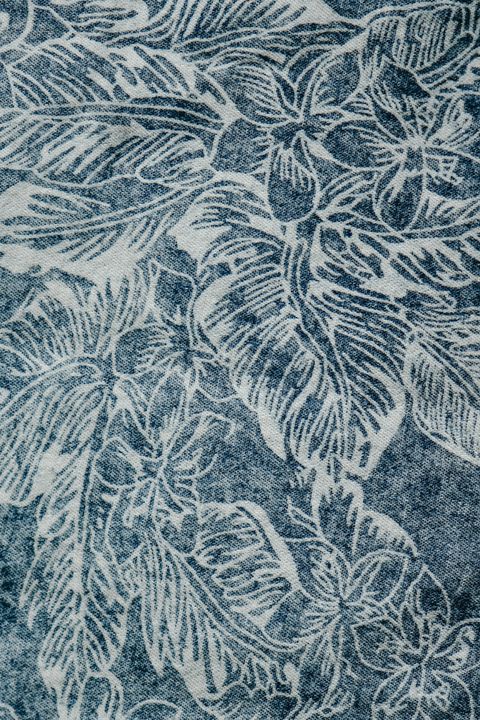 Indigo cotton fabric with a white leaf print