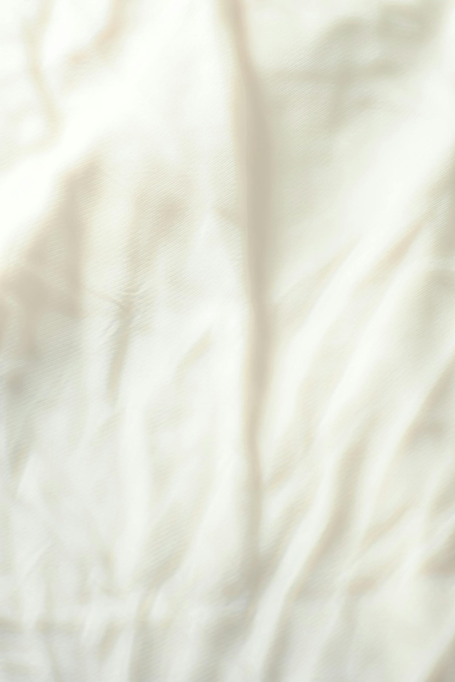 White Textile in Close Up Photography · Free Stock Photo