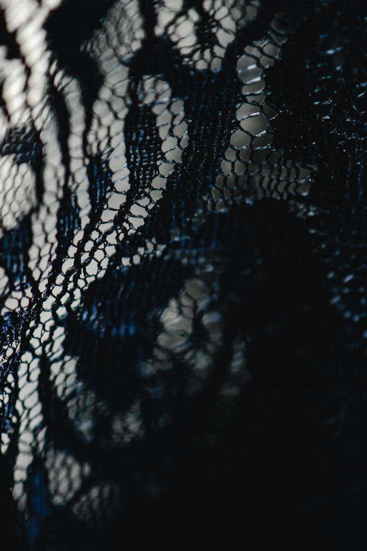 Black Embroidered Textile In Close-up Shot