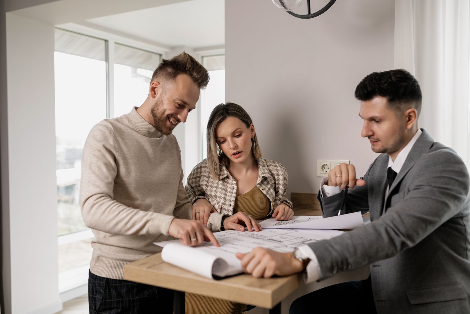 Real estate investor reviewing Kingwood rental property purchase documents