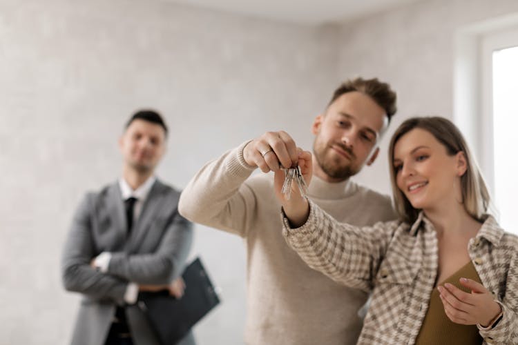 
A Couple Holding Their Keys