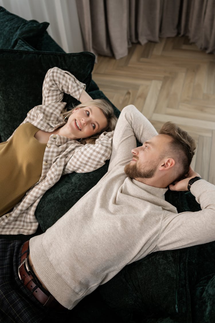 
A Couple Sitting On A Couch