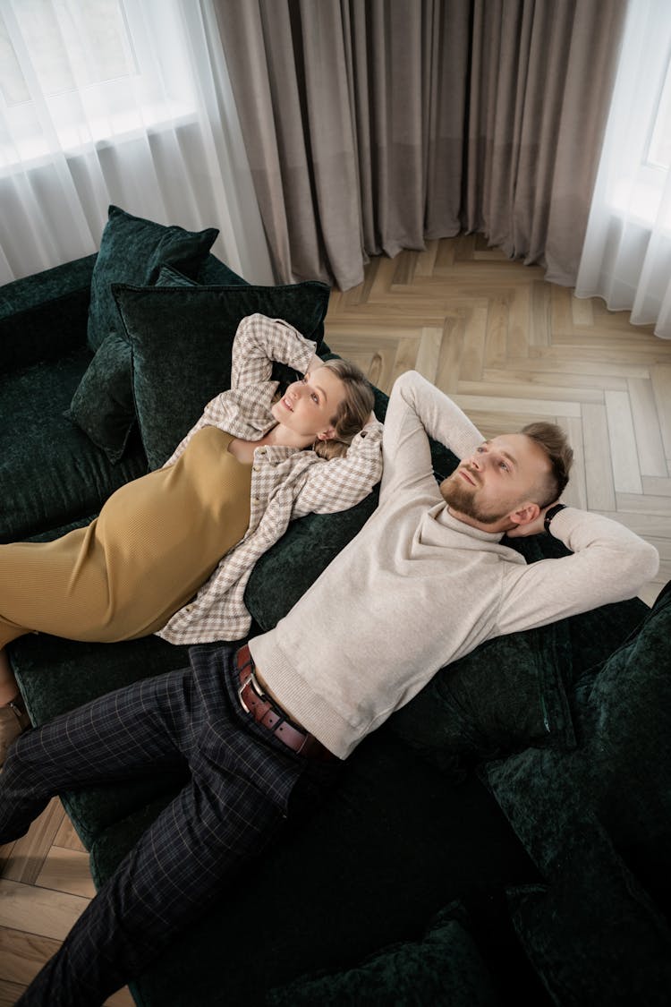 
A Couple Sitting On A Couch