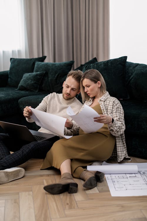 
A Couple Looking at Documents