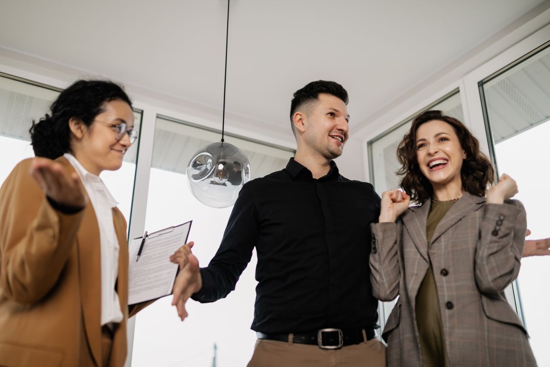 A real estate agent showing a listing