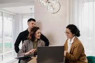A Man and a Woman Talking to an Agent