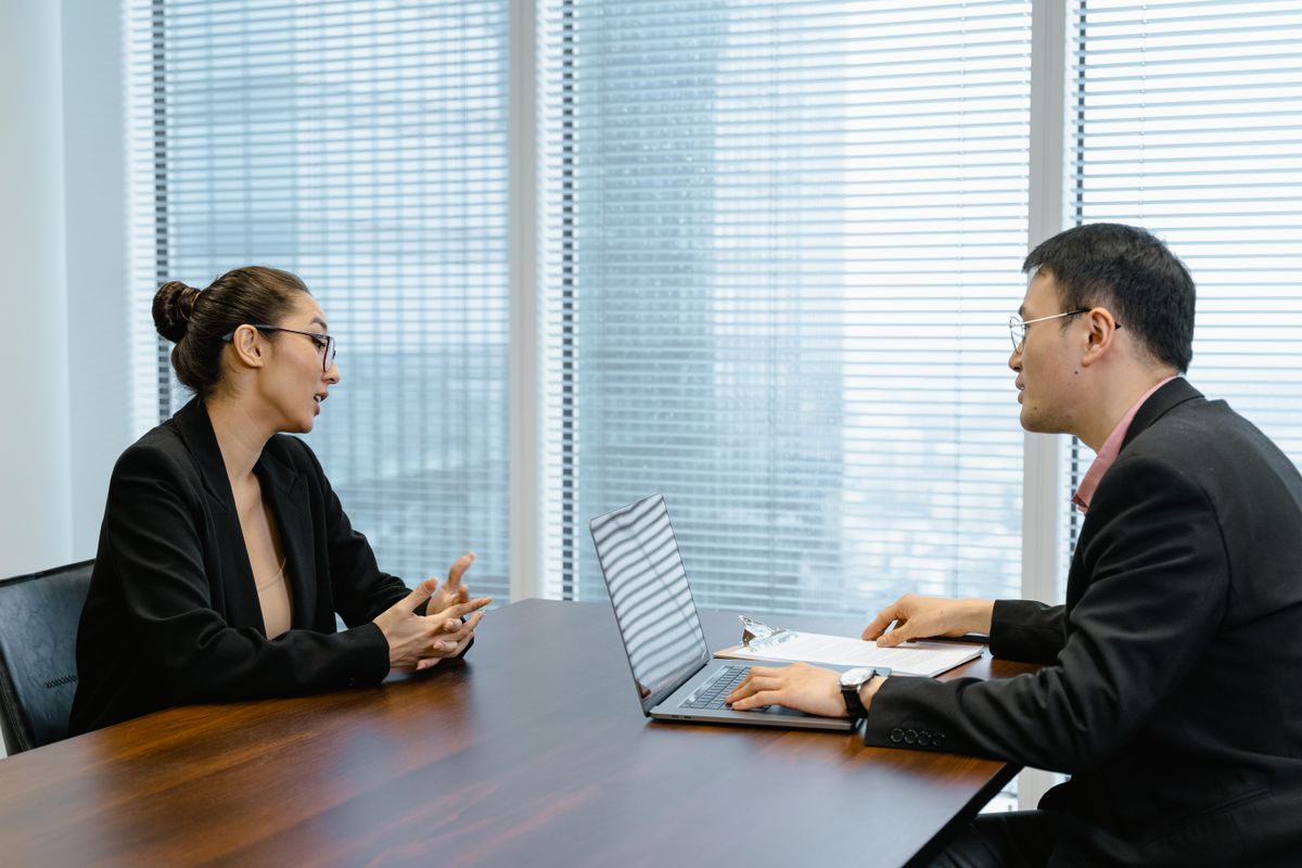 Two European colleagues in a focused business meeting