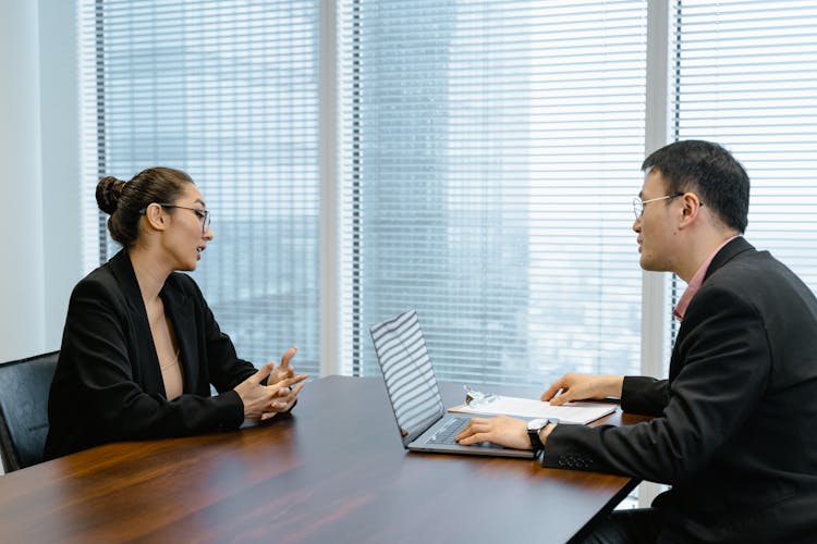 Businesspeople Talking In A Meeting