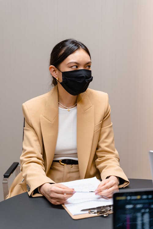 Woman in Blazer Wearing Face Mask