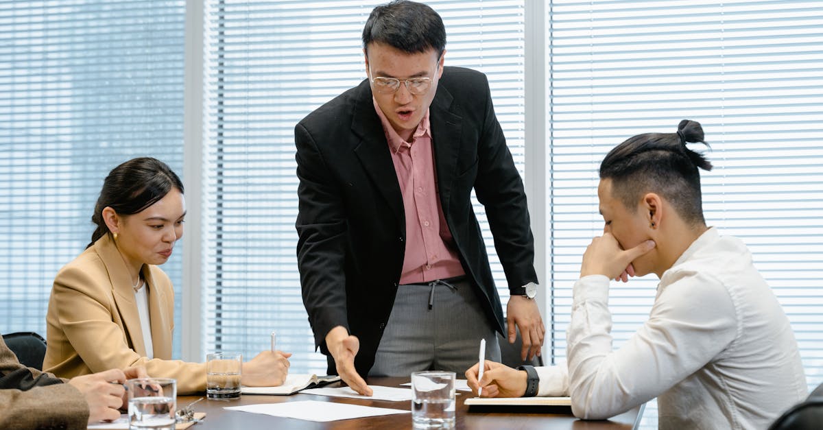 Professional team discussing strategy in a modern office setting.
