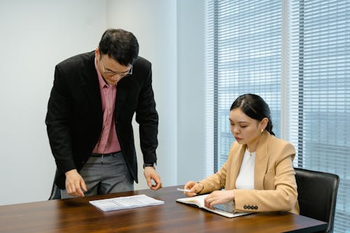 People Having a Meeting at the Conference Room