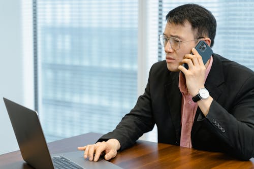 Free Man Talking on the Phone Busy Working  Stock Photo