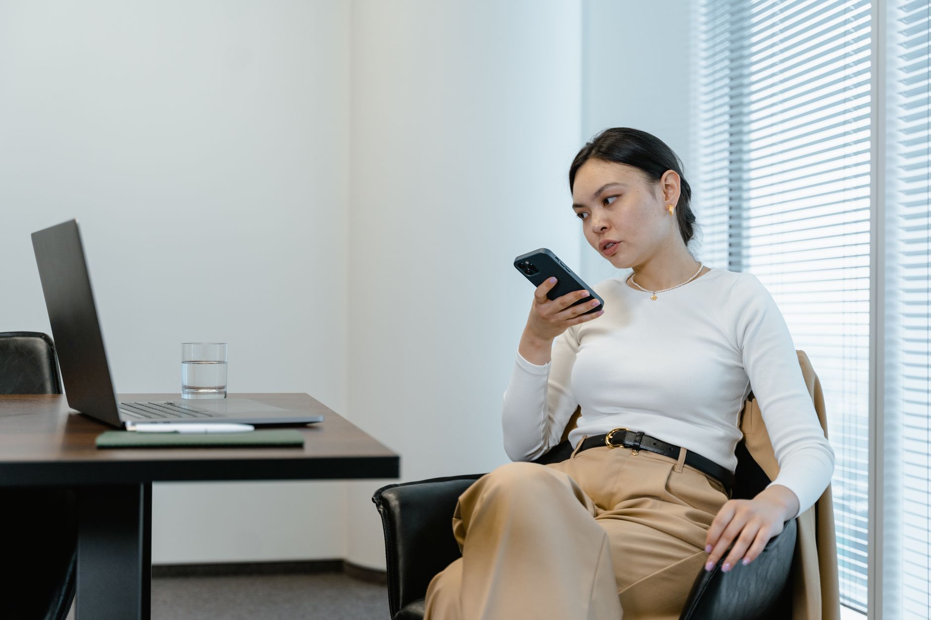 ADHD time blindness adhd symptoms time management â person setting phone timer focused expression cozy workspace natural window light