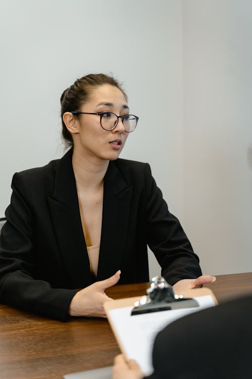 Free A Woman in a Business Meeting Stock Photo