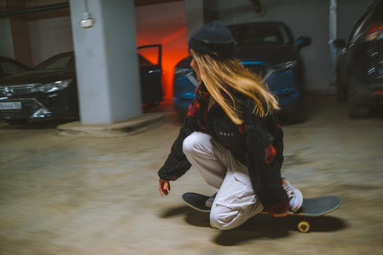 Woman Riding A Skateboard