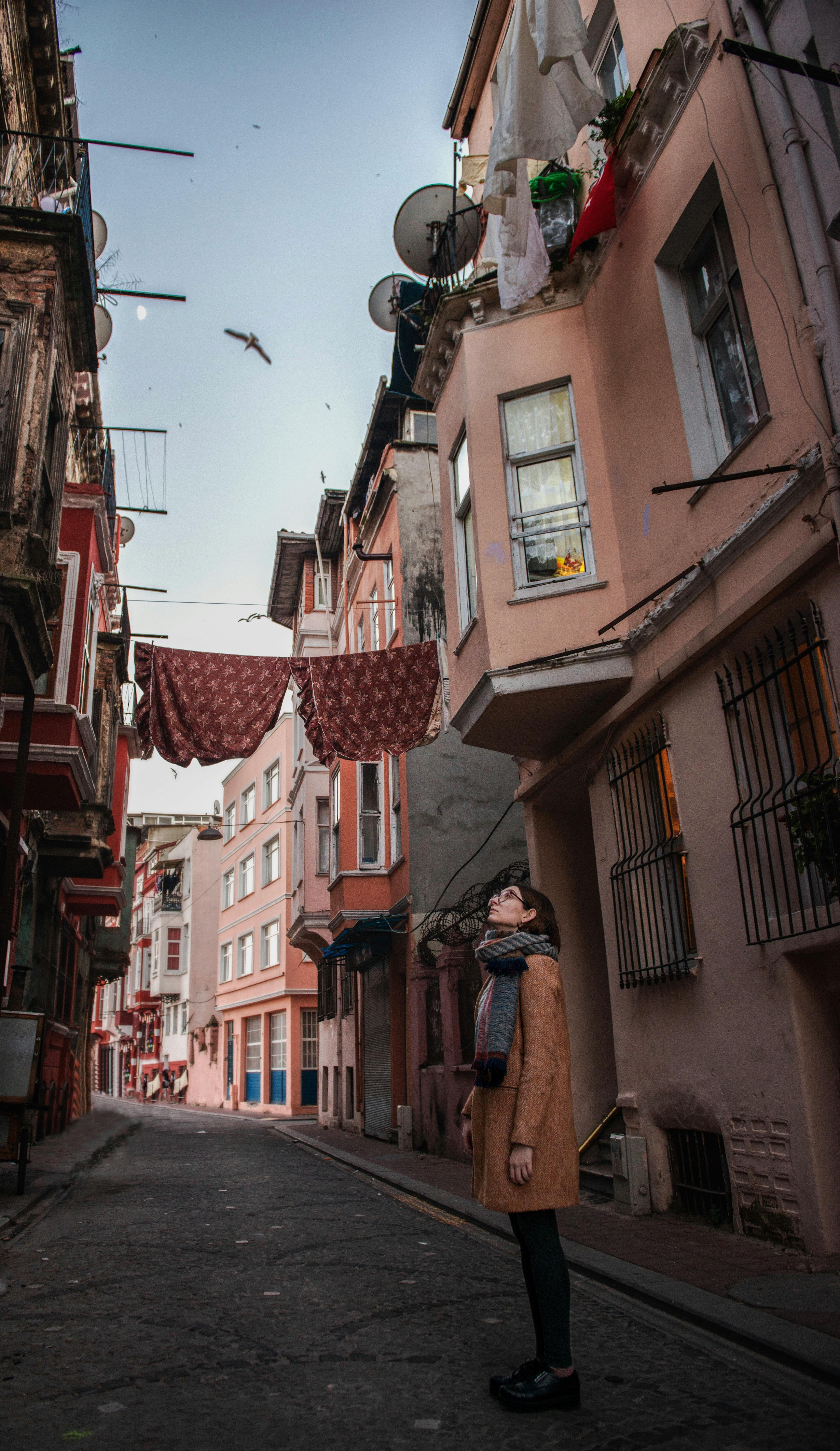 Picturesque alleyway with laundry lines and architecture in Istanbul, Türkiye.