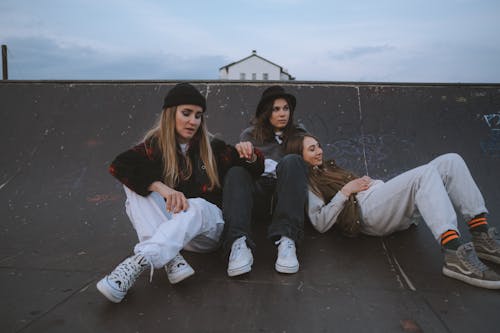 Free Friends Resting on a Ramp Stock Photo