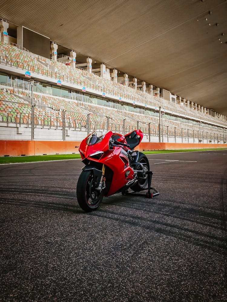 Red Sports Bike In The Middle Of Speedway