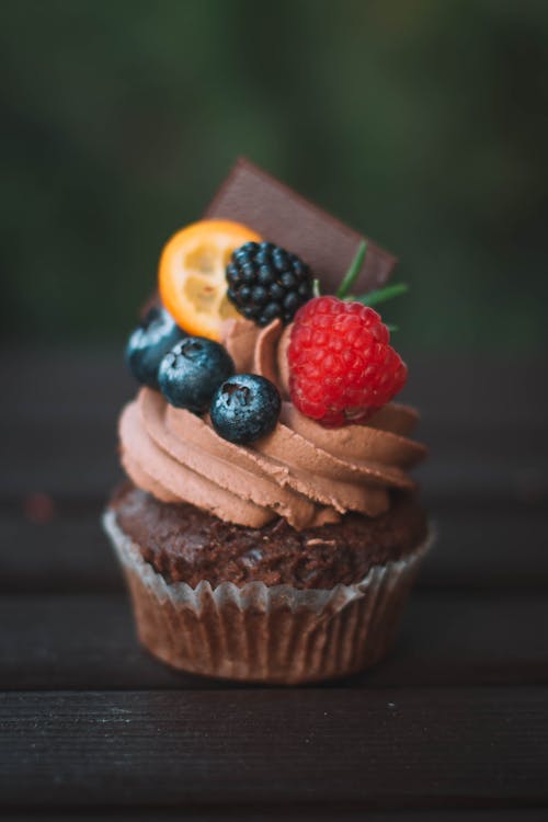 Chocolate cupcake decorated with berries